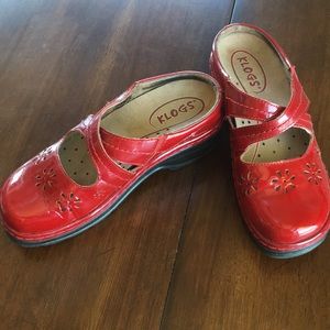 Comfy bright red Klogs. In good condition.